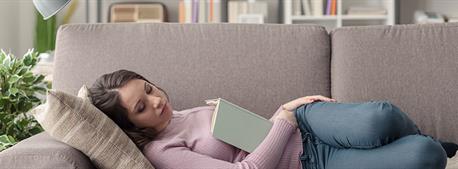 woman-sleeping-on-couch