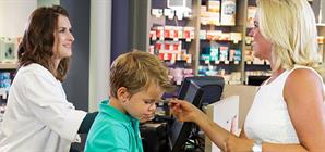 woman-with-child-at-pharmacist