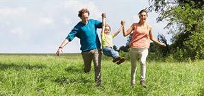 Een gelukkige familie dankzij hun tandzorgverzekering