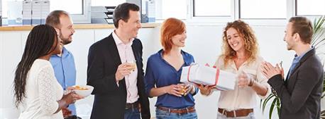 people-celebrating-in-office