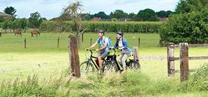 couple-cycling-in-the-countryside