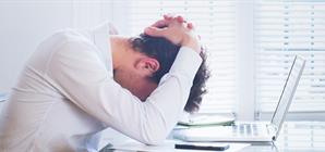 man with burnout at work