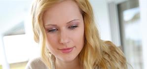 woman-looking-at-her-computer