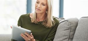 woman-making-a-choice-on-her-tablet